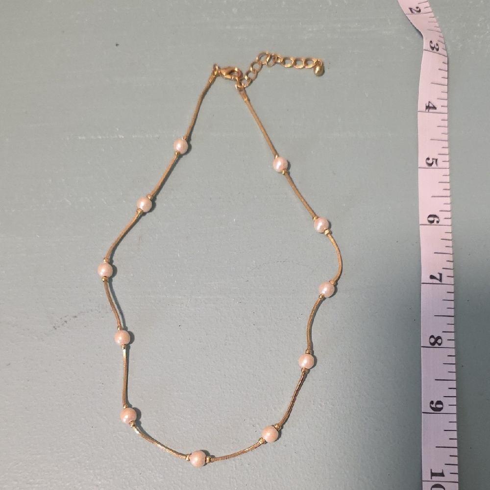 Elegant Gold and White Pearl Necklace